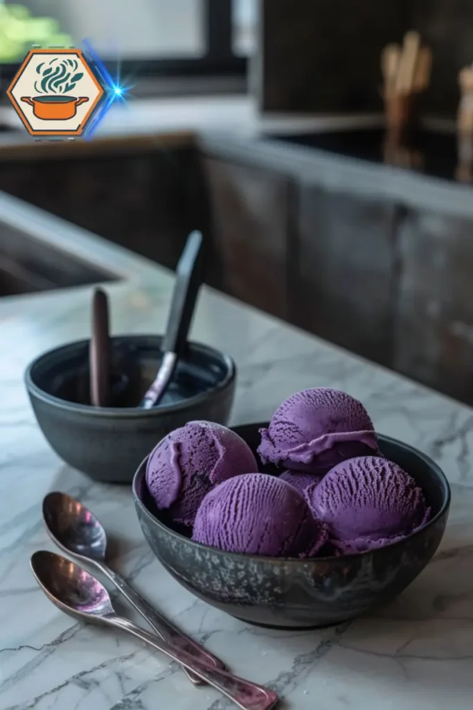 Ube ice cream scoops in a modern kitchen—highlighting the future of ube beyond the traditional cake recipe. Scoops of ube ice cream in a modern kitchen setting, symbolizing the evolution of traditional ube cake recipe into innovative desserts like ice cream and protein snacks.