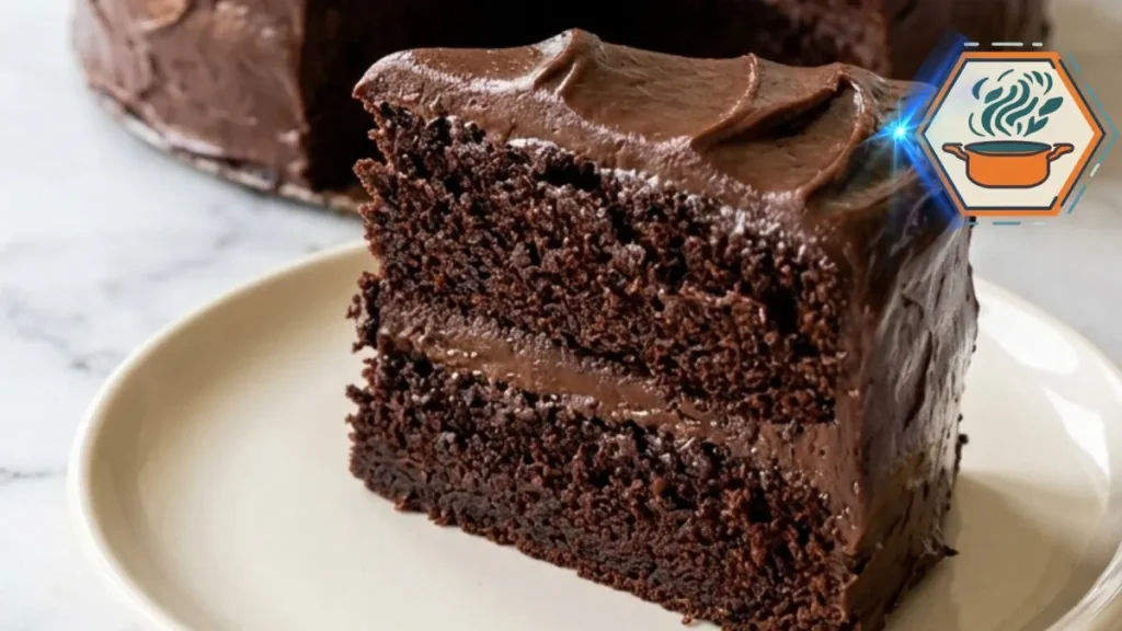 Homemade Chocolate Fudge Cake with two moist chocolate layers and thick fudge frosting