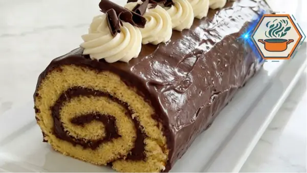 Chocolate Vanilla Swiss Roll with chocolate ganache and vanilla cream on a white marble kitchen counter