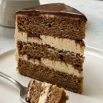 Coffee Chocolate Truffle Cream Cake with mascarpone coffee cream, chocolate ganache and hazelnut truffles