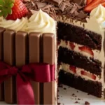 Strawberry Chocolate Gift Cake with fresh strawberries, vanilla cream, chocolate fingers, and red ribbon