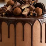 Ultimate Chocolate Overload Cake with chocolate ganache, truffles, wafers, and chocolate pieces